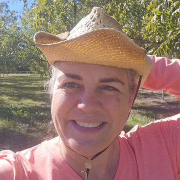 Kristen on pecan farm
